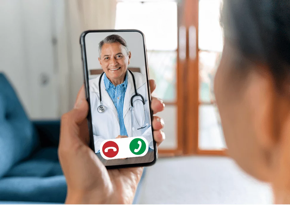 Patient having a video consultation with a doctor on a mobile phone